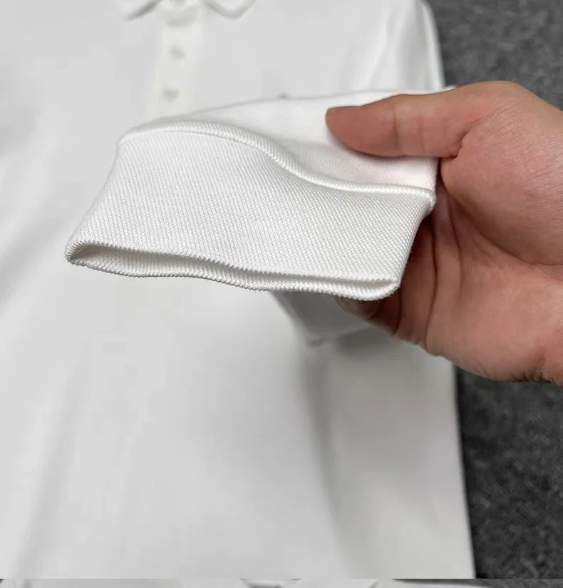 Camiseta polo com bordado de urso